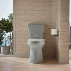 ContinuousClean XT two-piece elongated toilet with skirted trapway, 1.28 gpf^Kohler Outlet