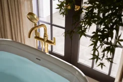 Floor-mount bath filler trim with handshower^Kohler Online