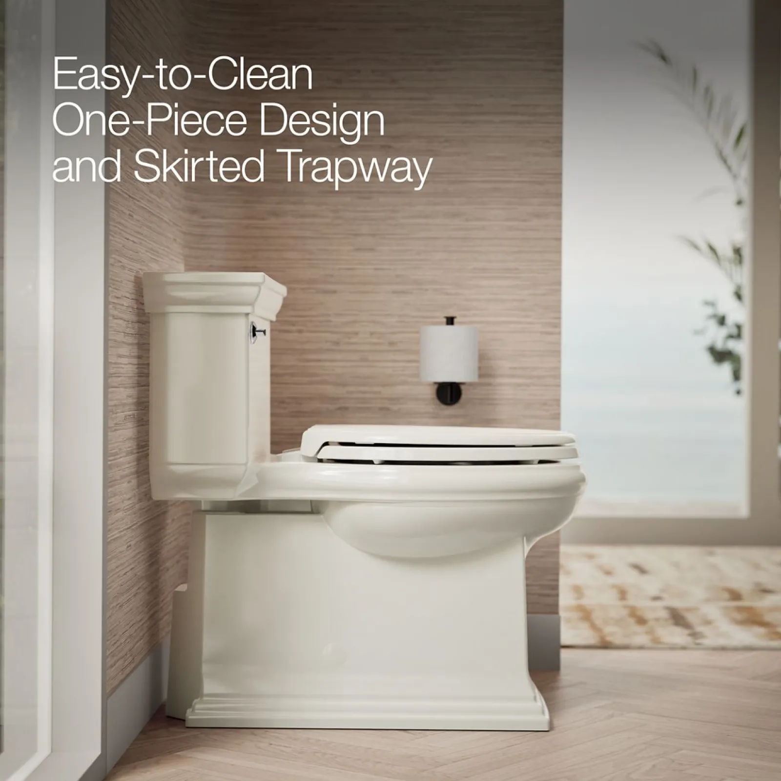 One-piece compact elongated toilet with skirted trapway, 1.28 gpf^Kohler Best