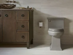 One-piece compact elongated toilet with skirted trapway, 1.28 gpf^Kohler Best
