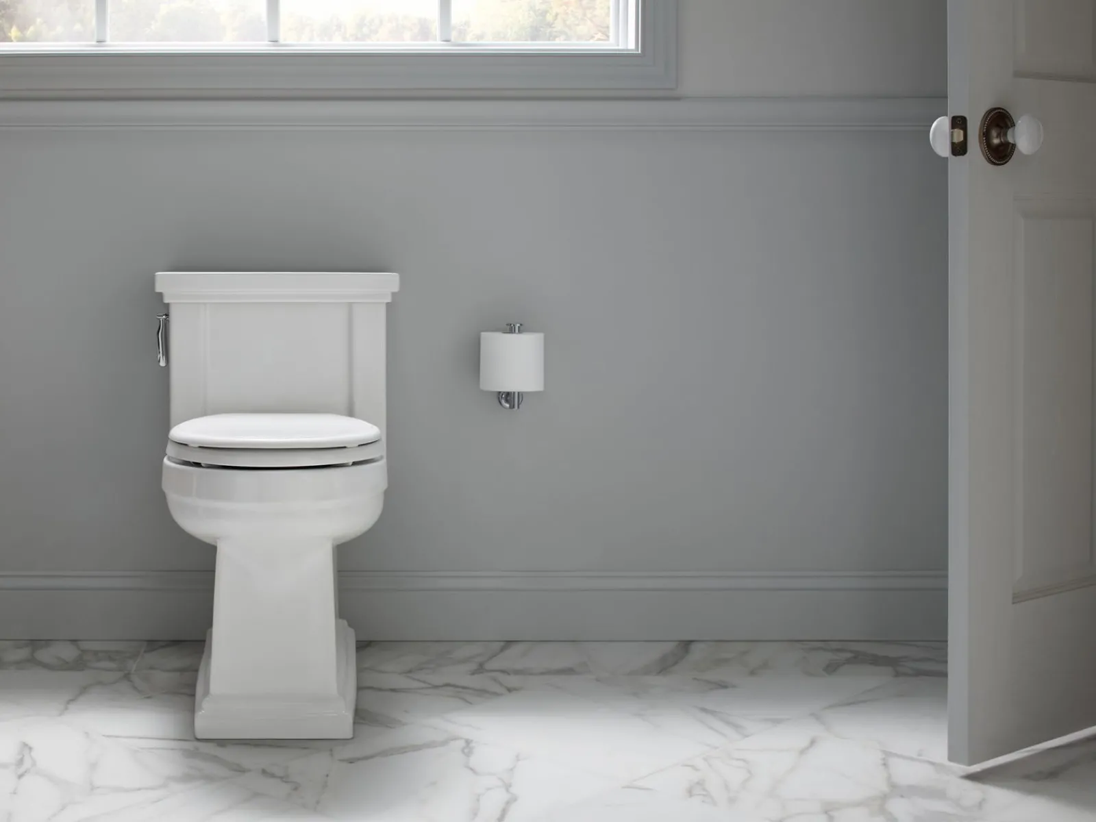 One-piece compact elongated toilet with skirted trapway, 1.28 gpf^Kohler Sale