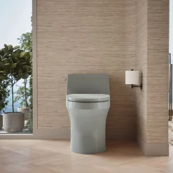 One-piece compact elongated toilet with concealed trapway, 1.28 gpf^Kohler