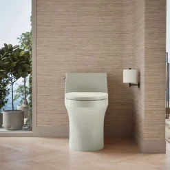 One-piece compact elongated toilet with concealed trapway, 1.28 gpf^Kohler