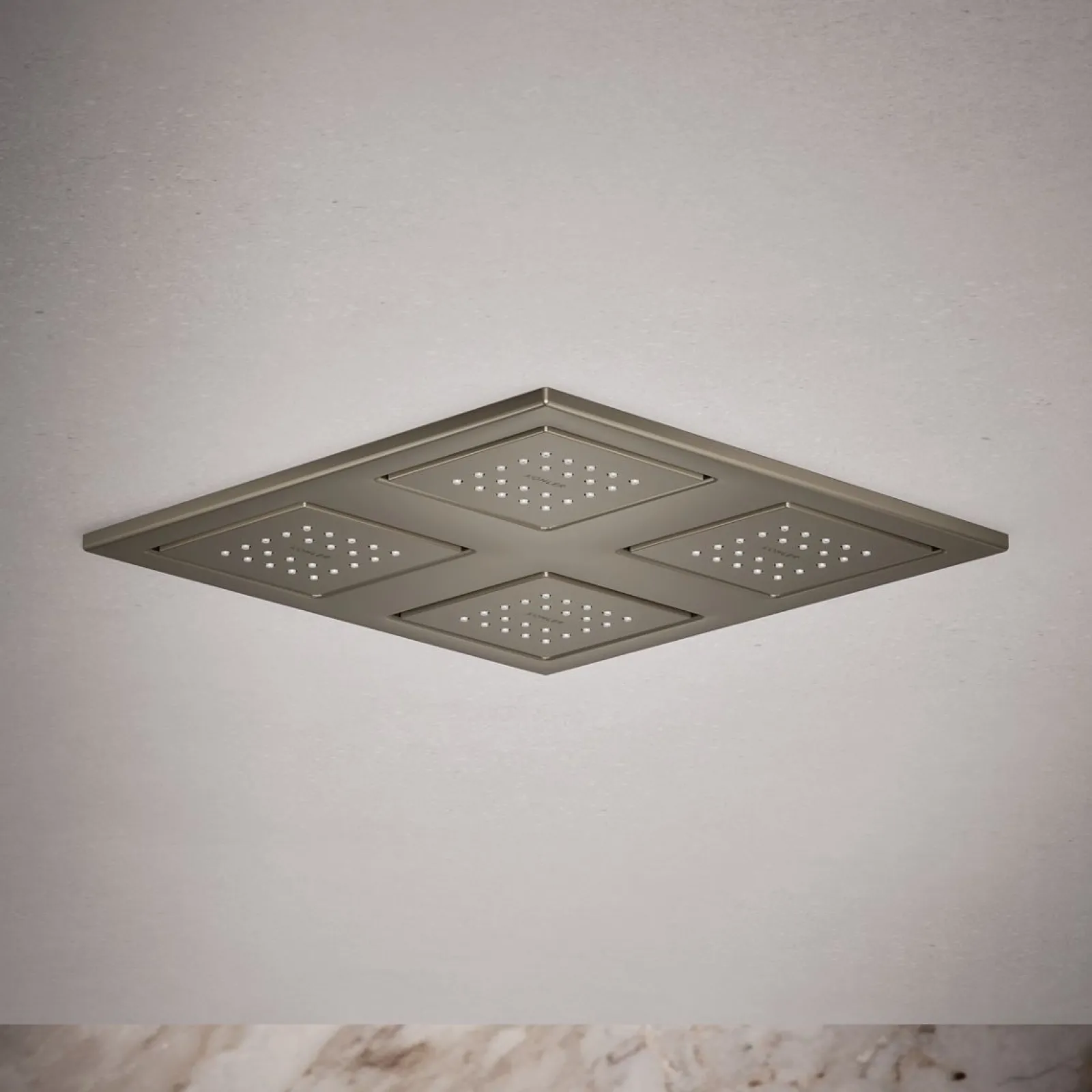 Overhead shower panel with four 22-nozzle sprayheads^Kohler