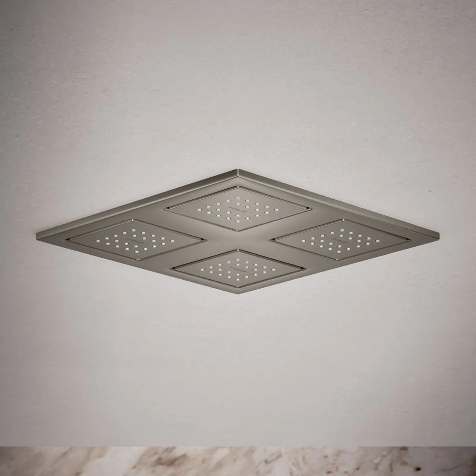 Overhead shower panel with four 22-nozzle sprayheads^Kohler