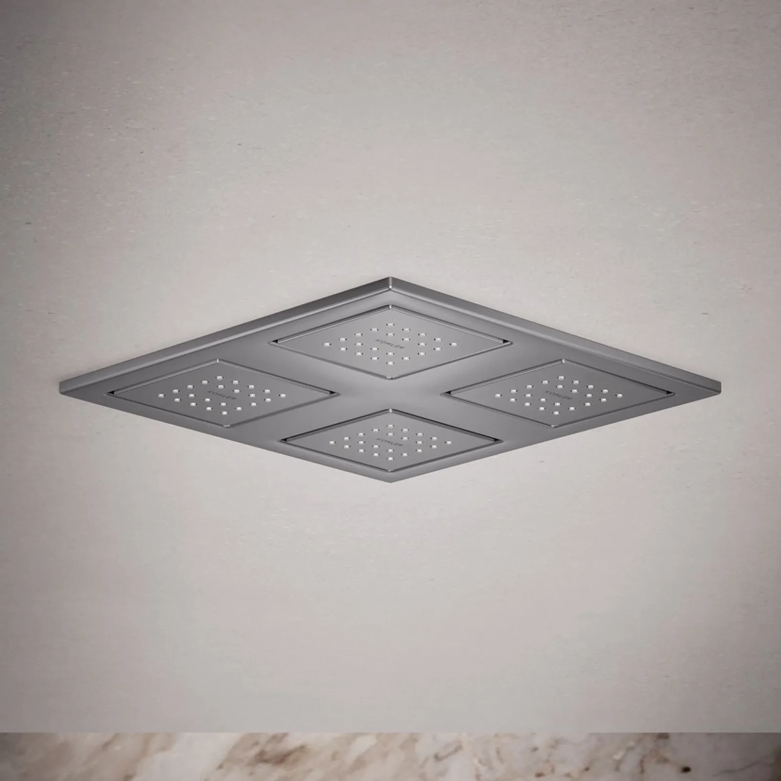 Overhead shower panel with four 22-nozzle sprayheads^Kohler