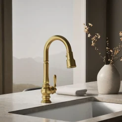 Pull-down kitchen sink faucet with three-function sprayhead^Kohler