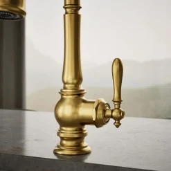 Pull-down kitchen sink faucet with three-function sprayhead^Kohler