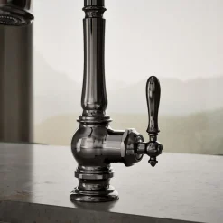Pull-down kitchen sink faucet with three-function sprayhead^Kohler