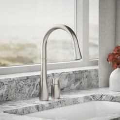 Pull-down kitchen sink faucet with three-function sprayhead^Kohler New