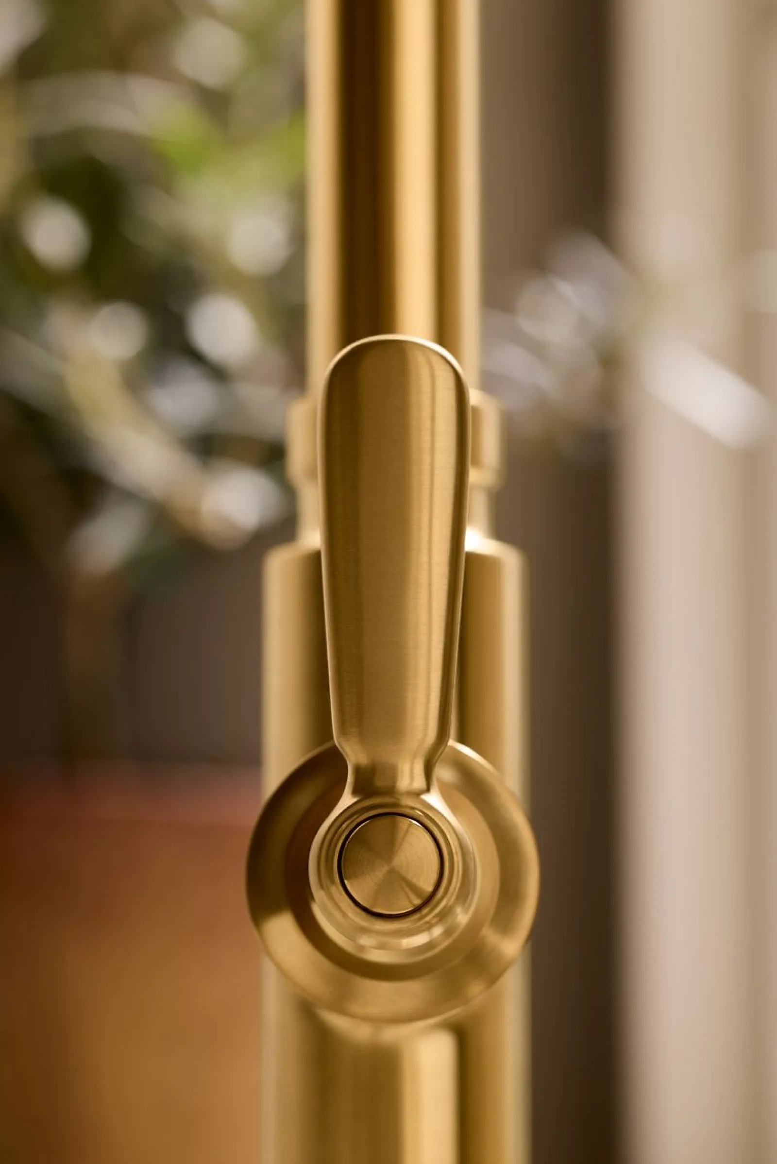 Pull-down kitchen sink faucet with three-function sprayhead^Kohler