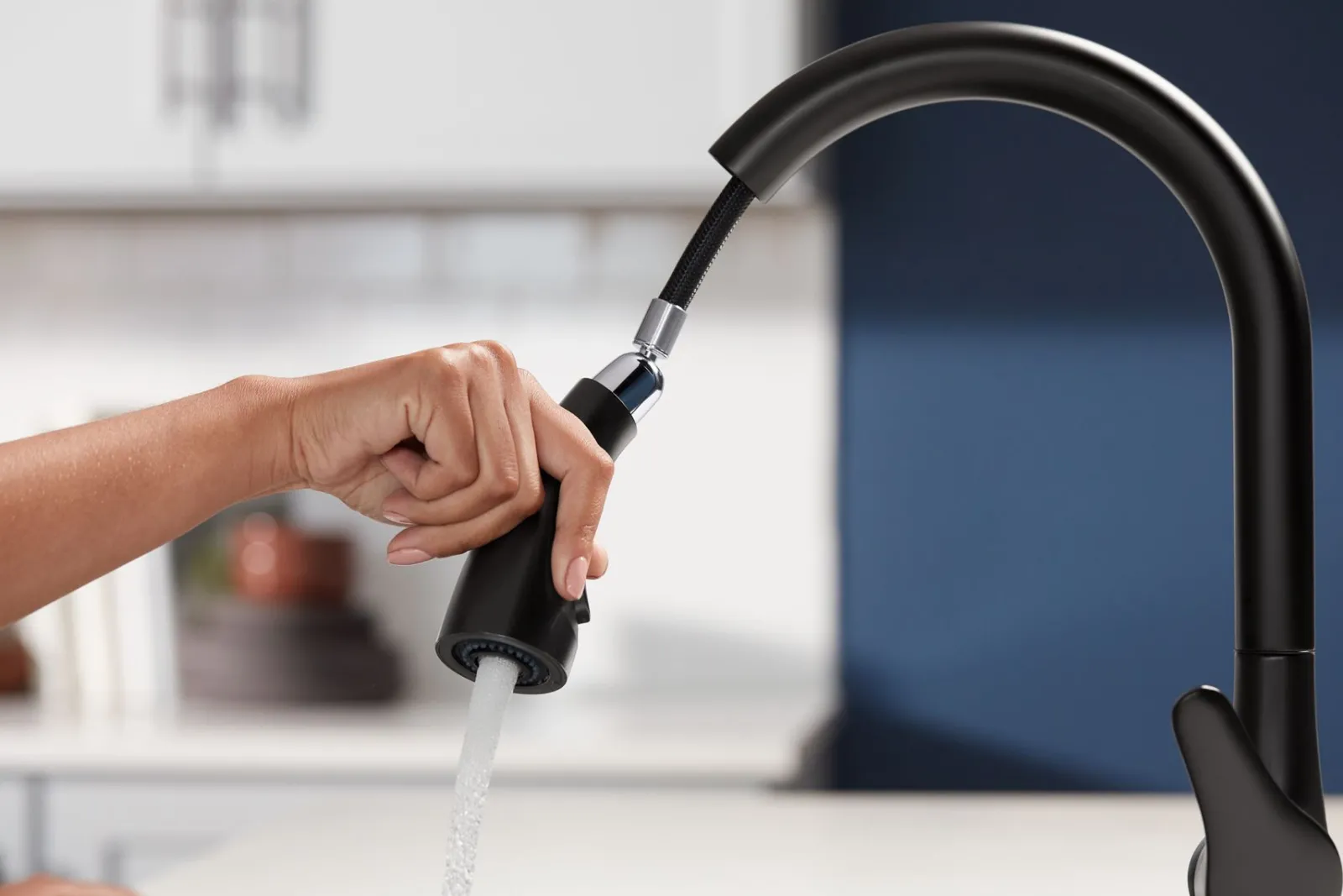 Pull-down kitchen sink faucet with two-function sprayhead^Kohler New