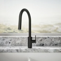 Pull-down kitchen sink faucet with two-function sprayhead^Kohler