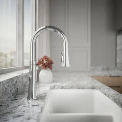 Pull-down kitchen sink faucet with three-function sprayhead^Kohler Hot