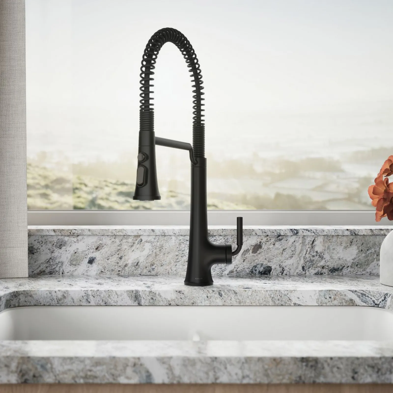Semi-professional pull-down kitchen sink faucet with three-function sprayhead^Kohler Hot