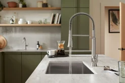 Semi-professional pull-down kitchen sink faucet with three-function sprayhead^Kohler Hot