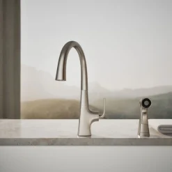 Single-handle kitchen sink faucet with two-function side sprayer^Kohler Hot