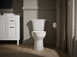 The Complete Solution® two-piece elongated toilet, 1.28 gpf^Kohler