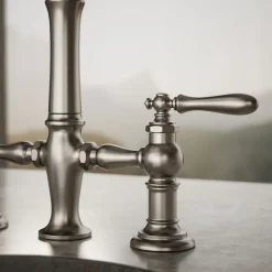 Three-hole bridge bar sink faucet with side sprayer^Kohler Outlet