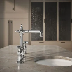 Three-hole bridge bar sink faucet with side sprayer^Kohler Outlet