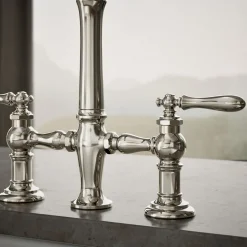 Three-hole bridge kitchen sink faucet with side sprayer^Kohler Outlet