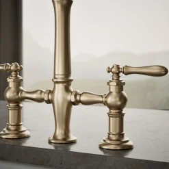Three-hole bridge kitchen sink faucet with side sprayer^Kohler Outlet