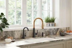Touchless pull-down kitchen sink faucet with three-function sprayhead^Kohler