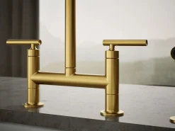 Two-hole bridge kitchen sink faucet with side sprayer^Kohler Hot