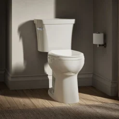 Two-piece elongated toilet, 1.28 gpf^Kohler Sale