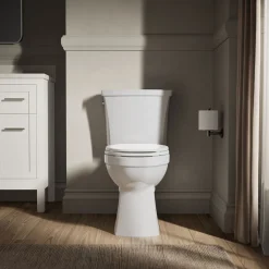 Two-piece elongated toilet, 1.28 gpf^Kohler Sale