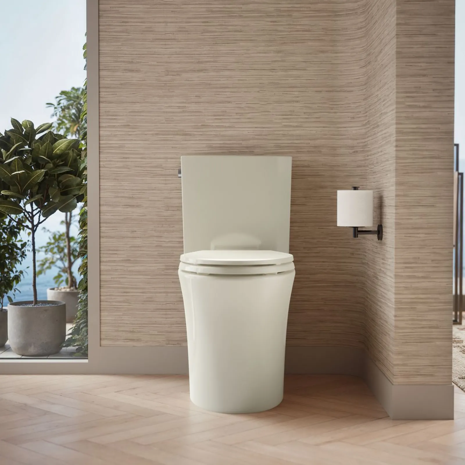 Two-piece elongated toilet with skirted trapway, 1.28 gpf^Kohler Hot