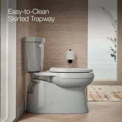 Two-piece elongated toilet with skirted trapway, 1.28 gpf^Kohler