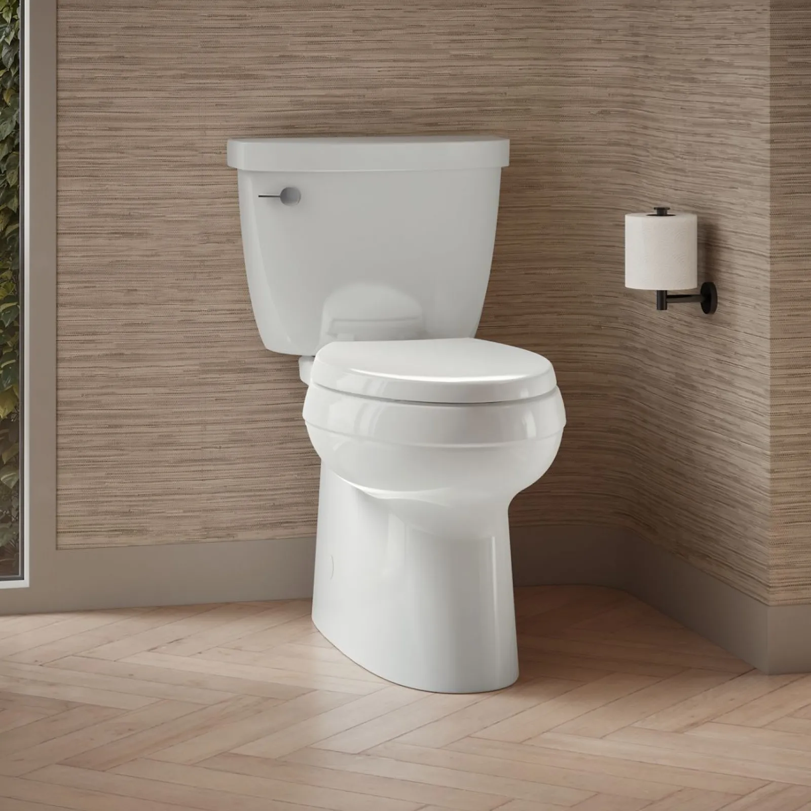 Two-piece elongated toilet with skirted trapway, 1.28 gpf^Kohler